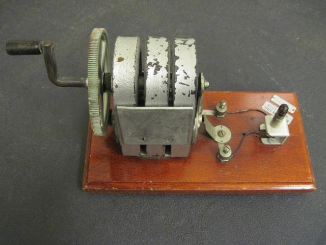 Hand-cranked generator with neon bulb