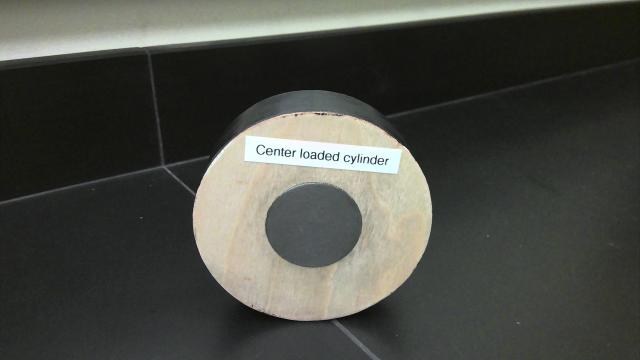 A disk with a weight in the center of it