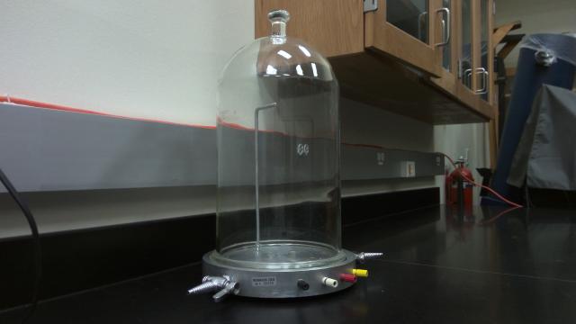 Empty bell jar used for atmospheric pressure demonstrations