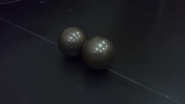 Two heavy steel balls