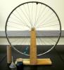 Mounted Bicycle Wheel with Vial